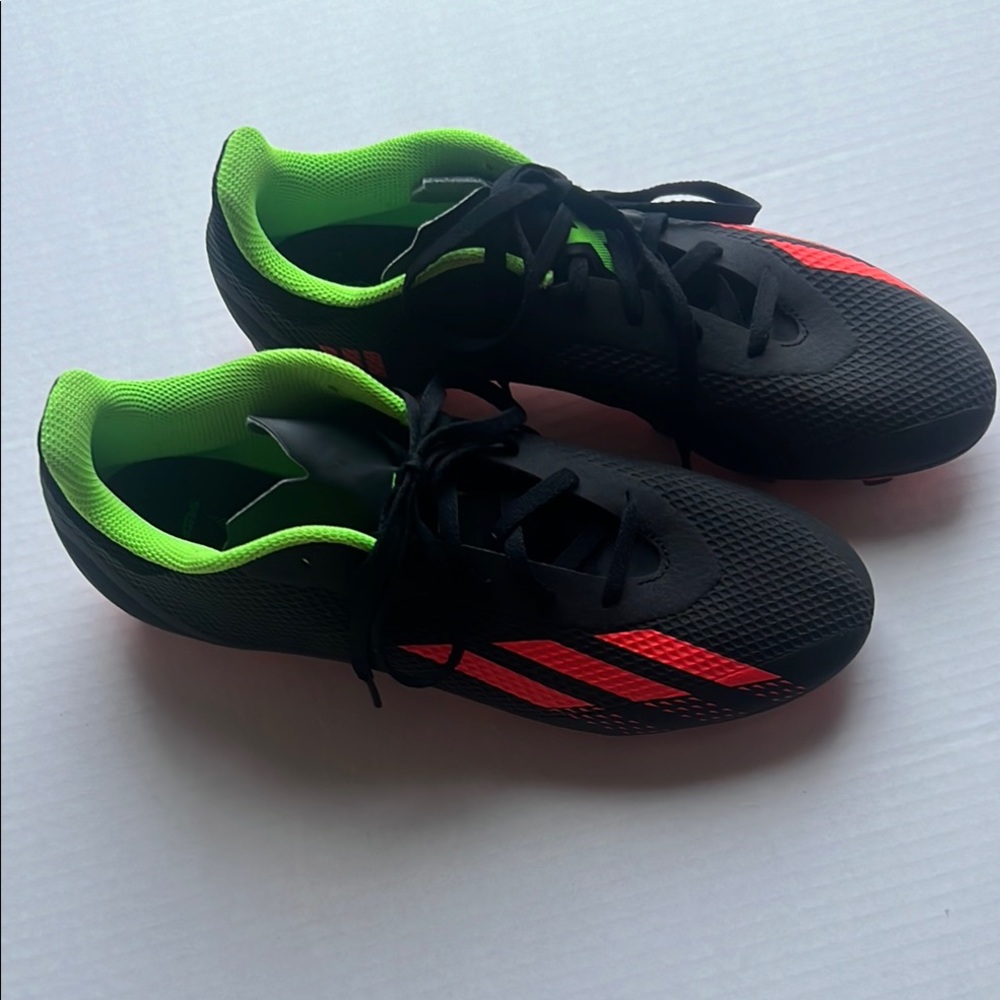 Adidas speed portal cleats  size 9 in black, orange and green
